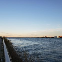 Down the riverwalk showing the Detroit River